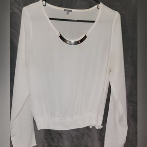 White long sleeve blouse with necklace accessory